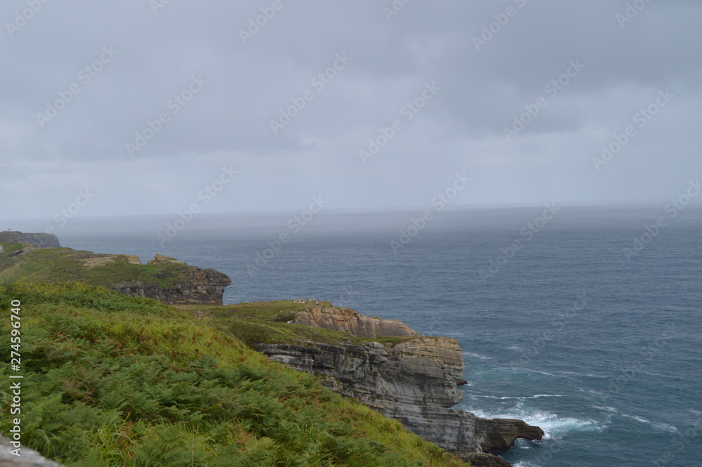 Cliff With A Great Green Meadow In Santander. August 24, 2013. Santander, Cantabria. Vacation Nature Street Photography.