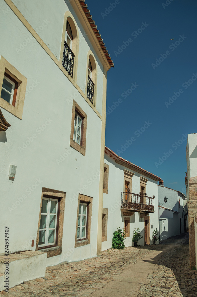 Baroque facade of old houses with whitewashed wall in Marvao