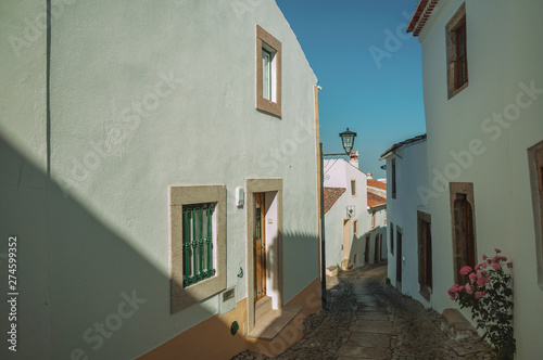 Old houses with whitewashed wall in an alley of Marvao © Celli07