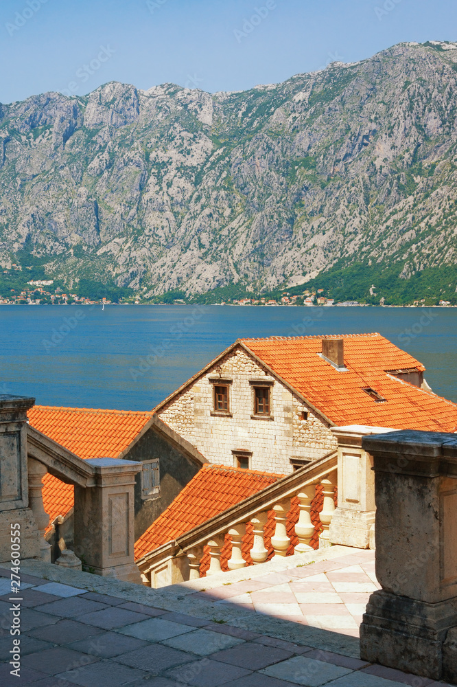 Summer Mediterranean landscape. Montenegro, Adriatic Sea, Bay of Kotor. Prcanj town. View from the stair of the Church of Birth of Our Lady