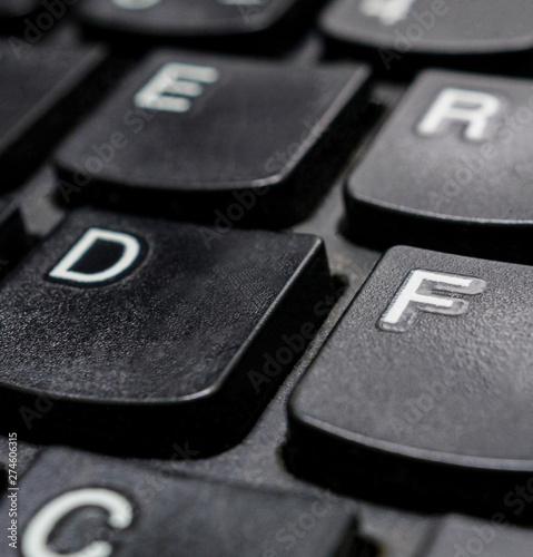 Close up black computer keyboard buttons