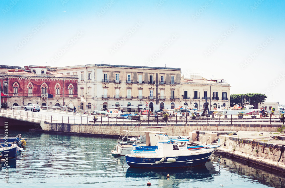 square near old port in Syracuse (Siracusa), Sicily, Italy, seafront of Ortygia (Ortigia) Island.