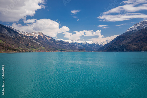 Brienz town on lake Brienz by Interlaken with the Swiss Alps covered by snow in the background, Switzerland, Europe