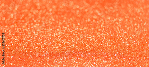 Orange glitter shiny texture background for christmas, Celebration concept.