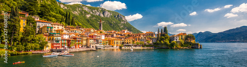 Canvas Print VARENNA, ITALY - June 1, 2019 - Varenna old town with the mountains in the backg