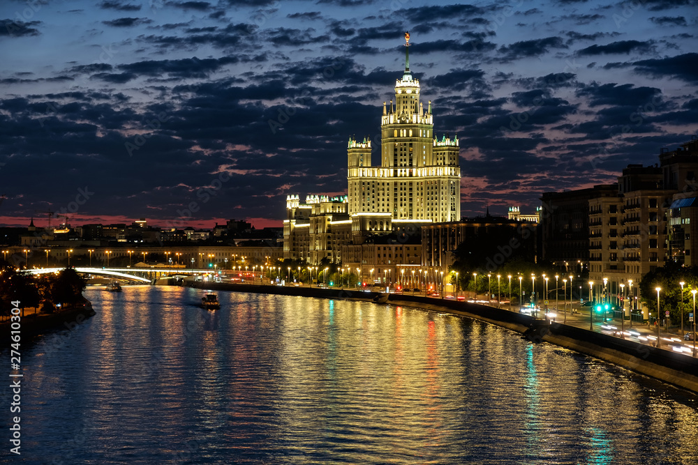 view of moscow house and river at night