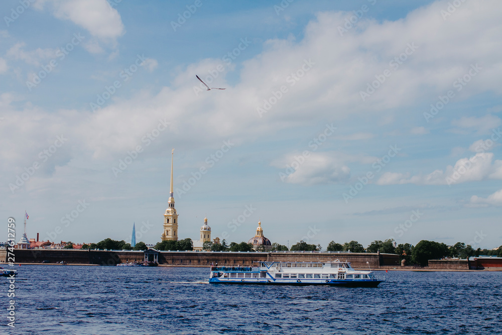 St. Petersburg, Russia - May 27, 2019. Tourist ships ride along the rivers and canals of tourists around St. Petersburg.