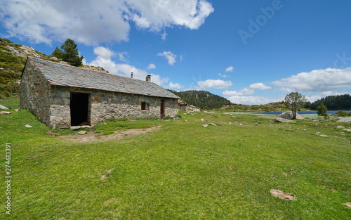 Refuge in the mountain near a lake, Pyrenees-Orientales, France, natural park of the Catalan Pyrenees