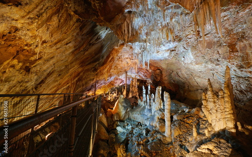 Stalactites and stalagmites with footbridge in the cave of the Grandes Canalettes, France, Pyrenees-Orientales, Villefranche de Conflent photo