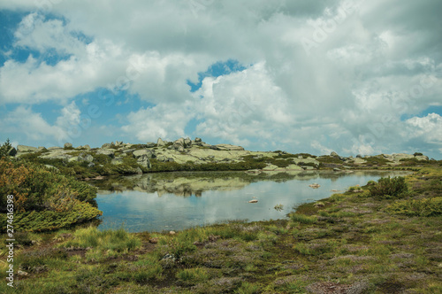 Lake among rocky terrain on highlands