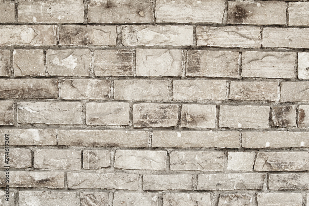 Wall of stone grey bricks, abstract background. Brick wall building Wall of stone grey bricks, abstract background. Brick wall building