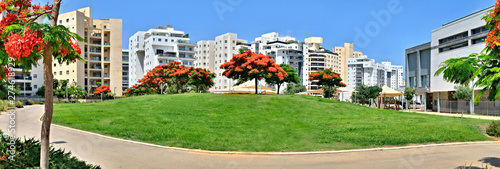 Panorama of a new residential area with modern houses and a large landscaping of the territory of the city of Holon in Israel