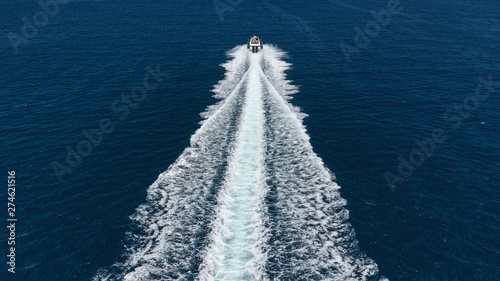 Εκτύπωση καμβά Aerial photo of inflatable rib speed boat cruising in high speed deep blue sea o