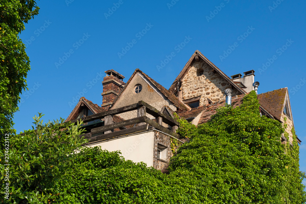 Detail of an old house in the Chevreuse Valley near Paris in France Detail of an old house in the Chevreuse Valley near Paris in France