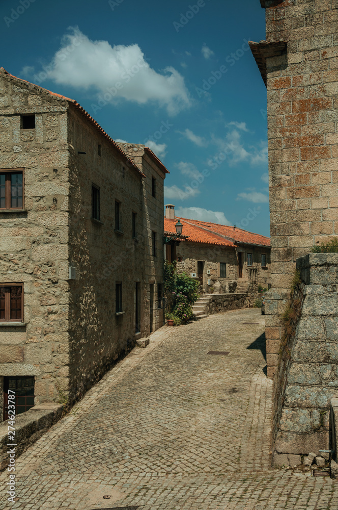 Old stone houses on a corner of deserted alley in Monsanto