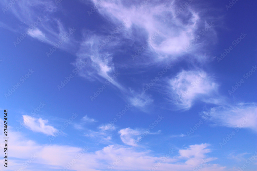 Beautiful sky background. White clouds and blue sky background. Nature, heaven concept.