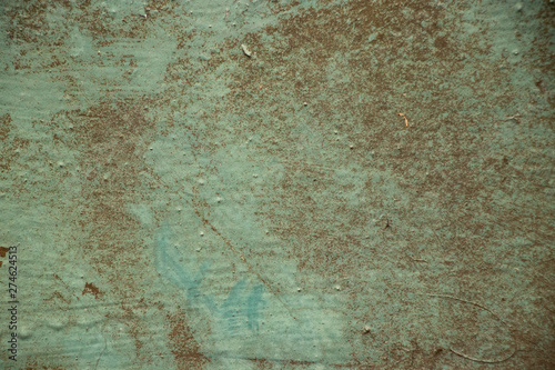 Ugly green grunge stained rough surface texture photo