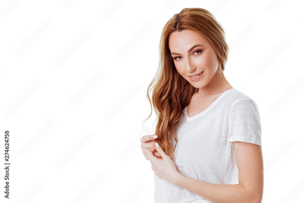 Portrait of emotive good-looking caucasian woman laughing while looking aside and standing against white background. Portrait of emotive good-looking caucasian woman laughing while looking aside and standing against white background.
