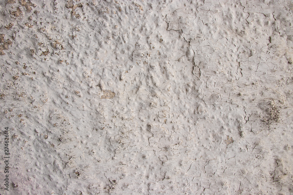 White painted grunge wall rough texture White painted grunge wall rough texture