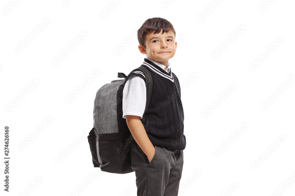 Schoolboy in a uniform with a backpack looking at the camera Schoolboy in a uniform with a backpack looking at the camera