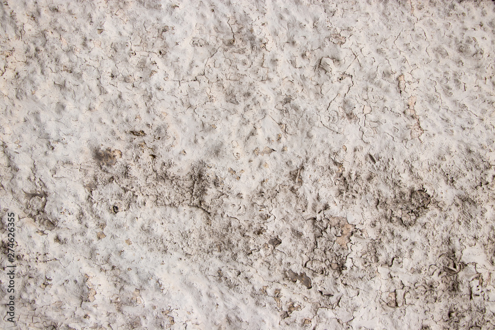 White painted grunge wall rough texture White painted grunge wall rough texture
