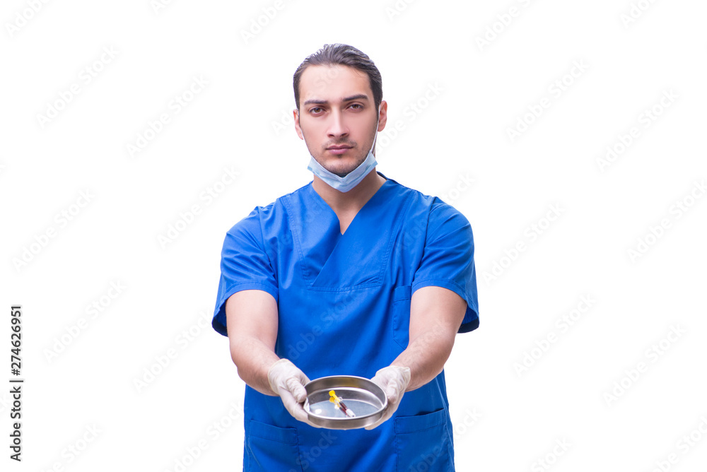 Young handsome doctor with syringe isolated on white Young handsome doctor with syringe isolated on white