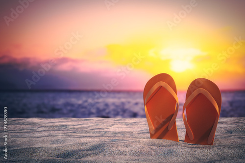 Stylish flip flops on beach