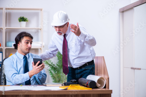 Two architects working on the project 