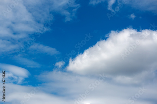 Fototapeta Naklejka Na Ścianę i Meble -  white clouds in bright blue sky