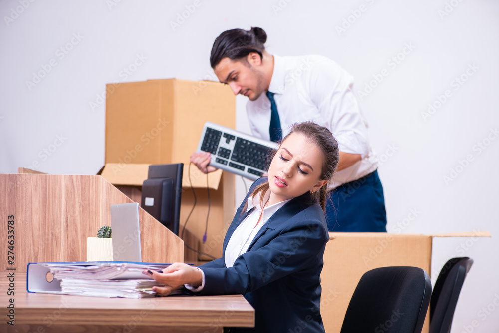 Two employees being fired from their work Two employees being fired from their work