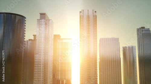 Business skyscrapers at sunset reflected in windows, Bangkok, Thailand. Vintage filtered.