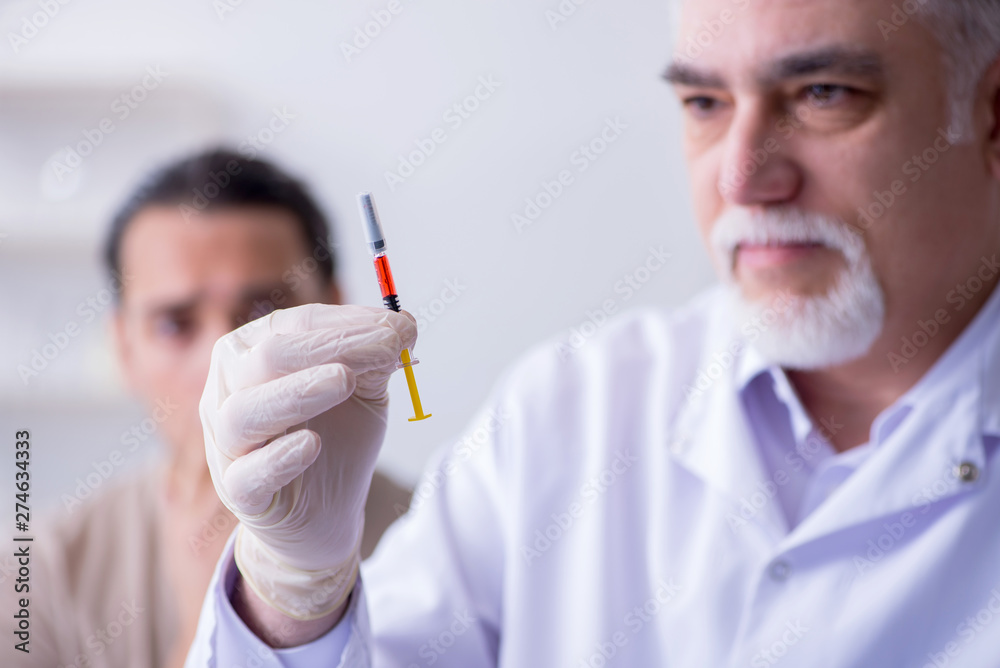 Male patient visitng doctor for shot inoculation Male patient visitng doctor for shot inoculation