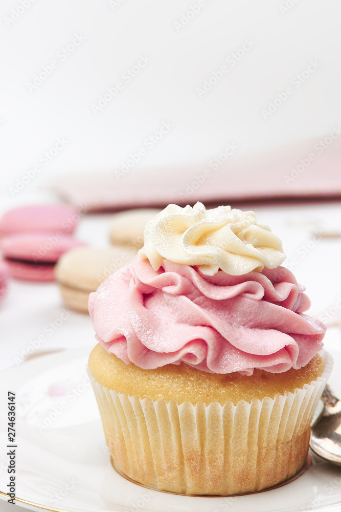 pink cupcake with gold vintage spoon and plate confetti macarons scene party 