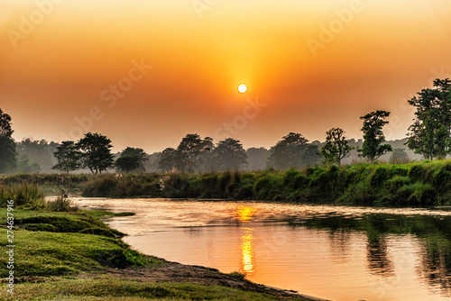 Sunset over the river in Chitwan National Park, Nepal