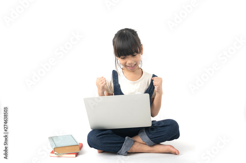 young Asian glad and happy girl student looking on laptop isolated on white background, searching internet and get knowledge concept
