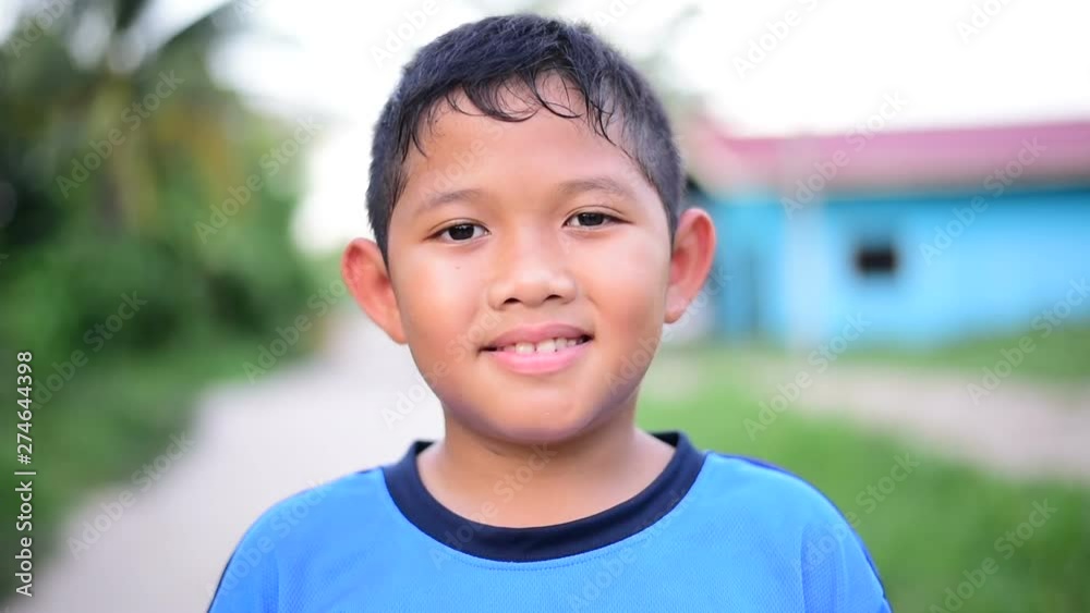 Portrait of Little happy country boy smiling at camera Portrait of Little happy country boy smiling at camera