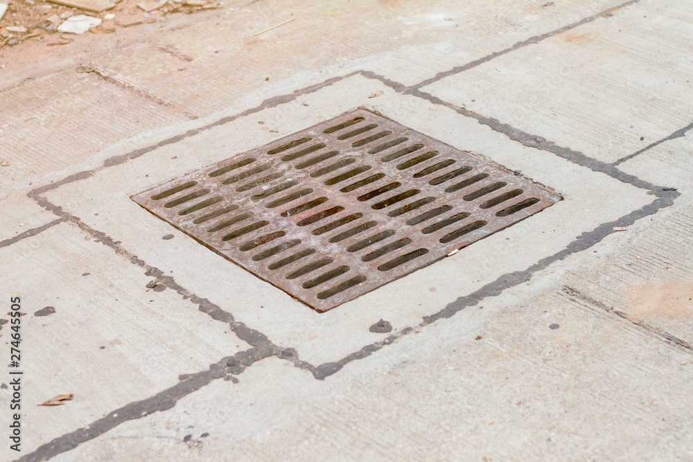 Road drains-Drain on concrete road in Thailand. Road drains-Drain on concrete road in Thailand.