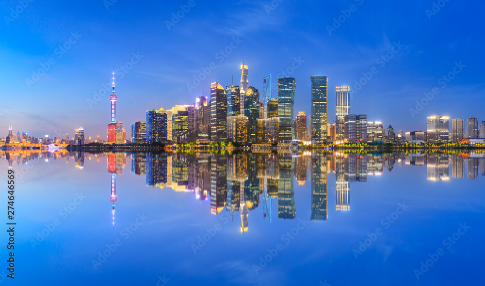 Naklejka premium Shanghai skyline with modern urban skyscrapers at night,China