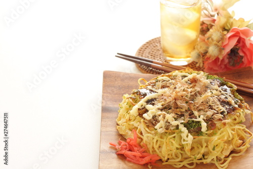 Japanese food, noodles pancake Okonomiyaki photo