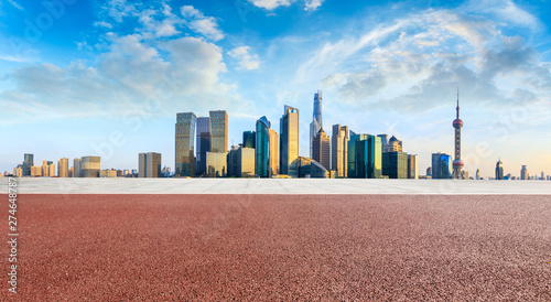 Panoramic skyline and buildings with empty square floor in Shanghai