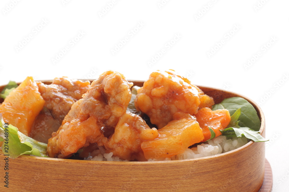 Chinese food, sweet and sour pork on rice for lunch box image Chinese food, sweet and sour pork on rice for lunch box image