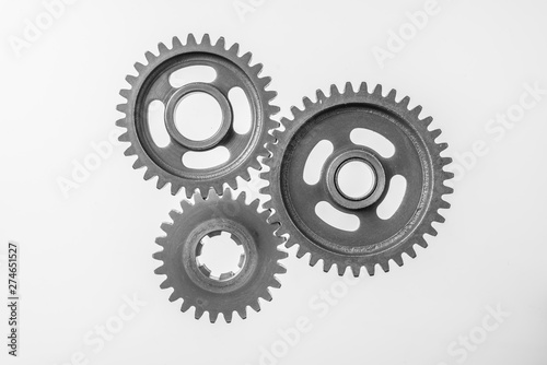 top view of 3 metal gear isolated on white photo