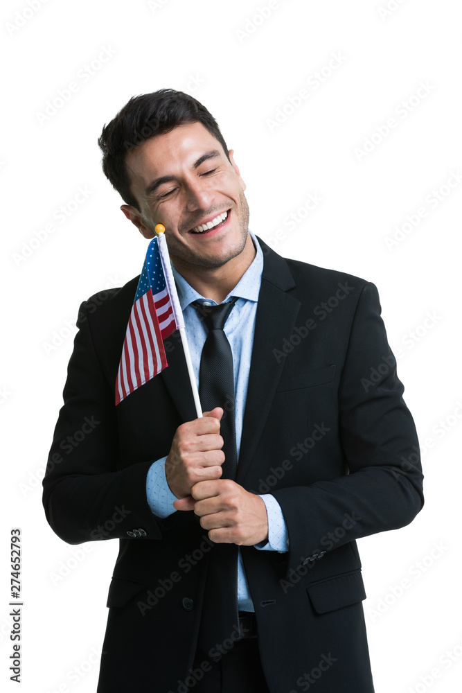 Caucasian businessman lifting America flag . Caucasian businessman lifting America flag .