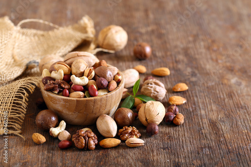 organic mix nuts on a wooden table photo
