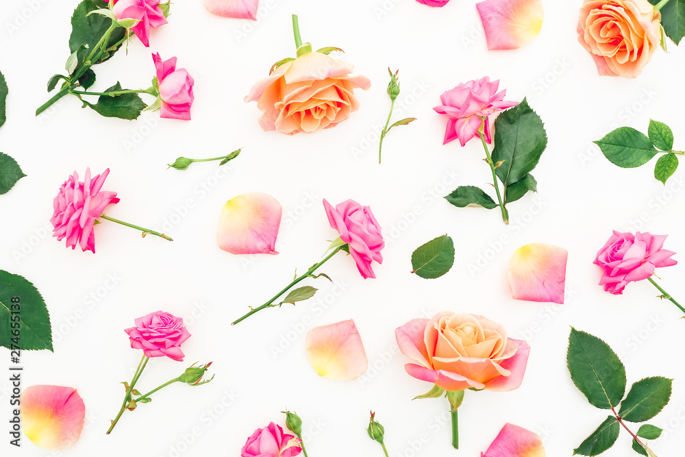 Floral pattern of roses flowers on white background. Flat lay, top view.