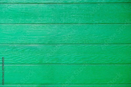 House wall is made imitation of natural green wood