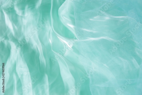 Wallpaper Mural Textile and texture concept - close up of crumpled silk turquoise wavy fabric background with copy space for text or image Torontodigital.ca