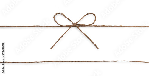 String twine rope bow isolated on white. photo