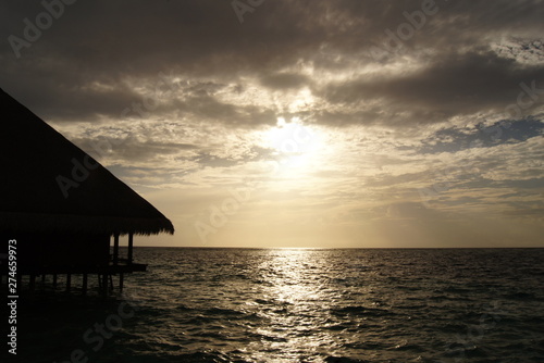 Cloudy sky over a tropical island resort in the evening