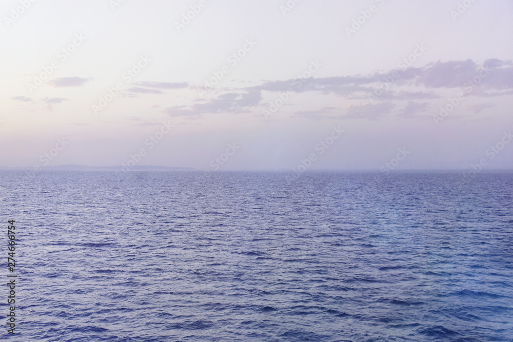 View to the blue  sea from the big ship neart port. Peaceful serene landscape.